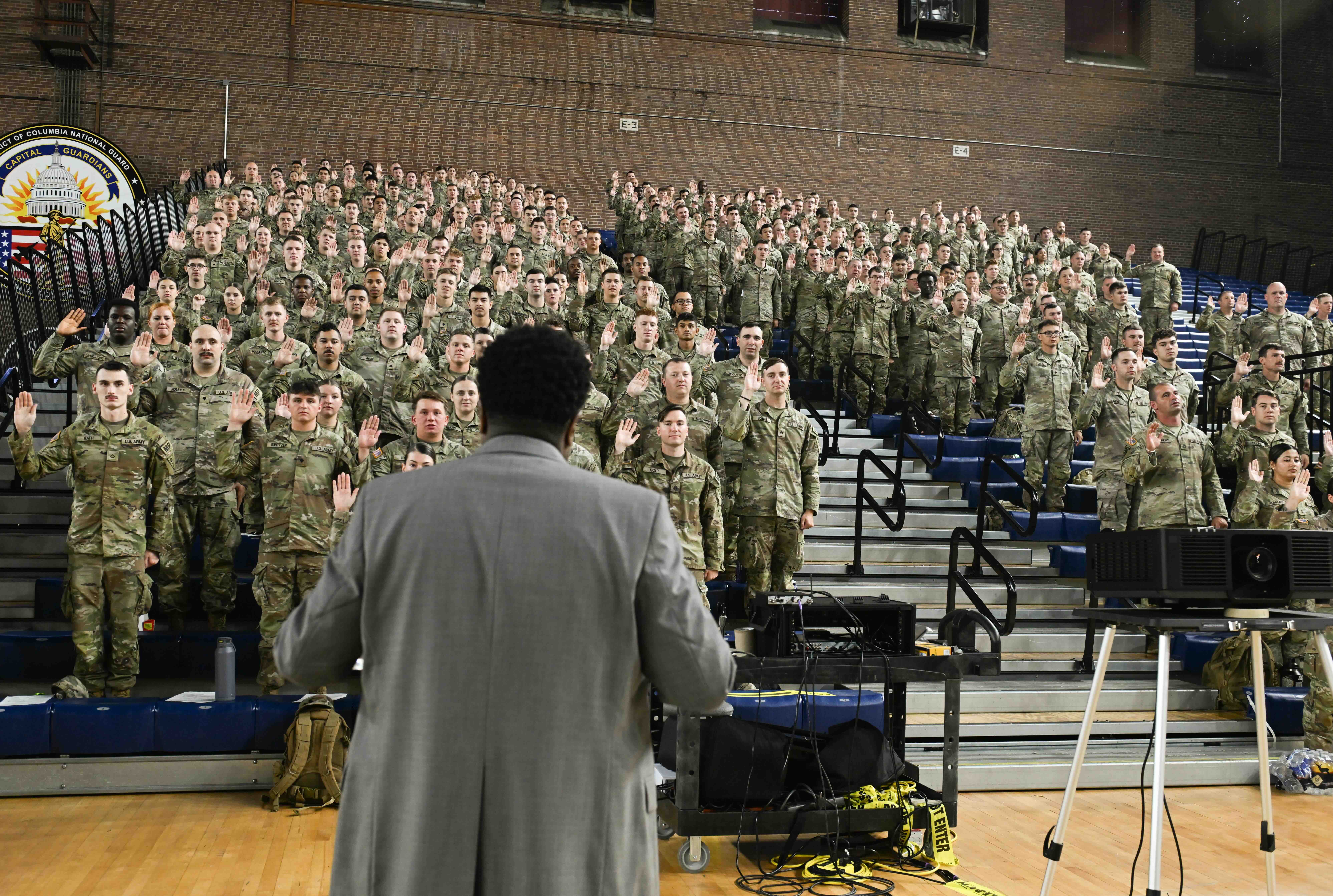 U.S. Soldiers from the Ohio and Tennessee National Guard are deputized at the D.C. Armory as part of D.C. Safe and Beautiful Task Force, Washington, D.C., Aug. 21, 2025. More than 1,500 National Guard service members comprise JTF-DC, supporting the D.C. Safe and Beautiful Task Force. These National Guard service members provide critical support, including crowd management, presence patrols, and perimeter control, in support of law enforcement. (U.S. Army photo by Pfc. Nina Cortez)
